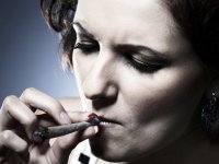 1364862911_woman-smoking-marijuana-neutral-shutterstock.jpg