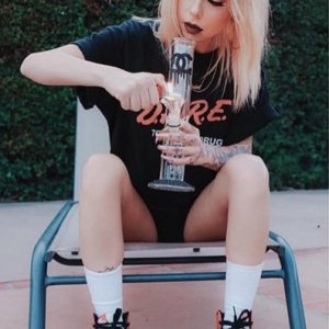 Smokes marijuana through bong
