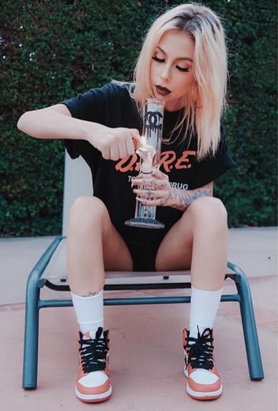 Smokes marijuana through bong